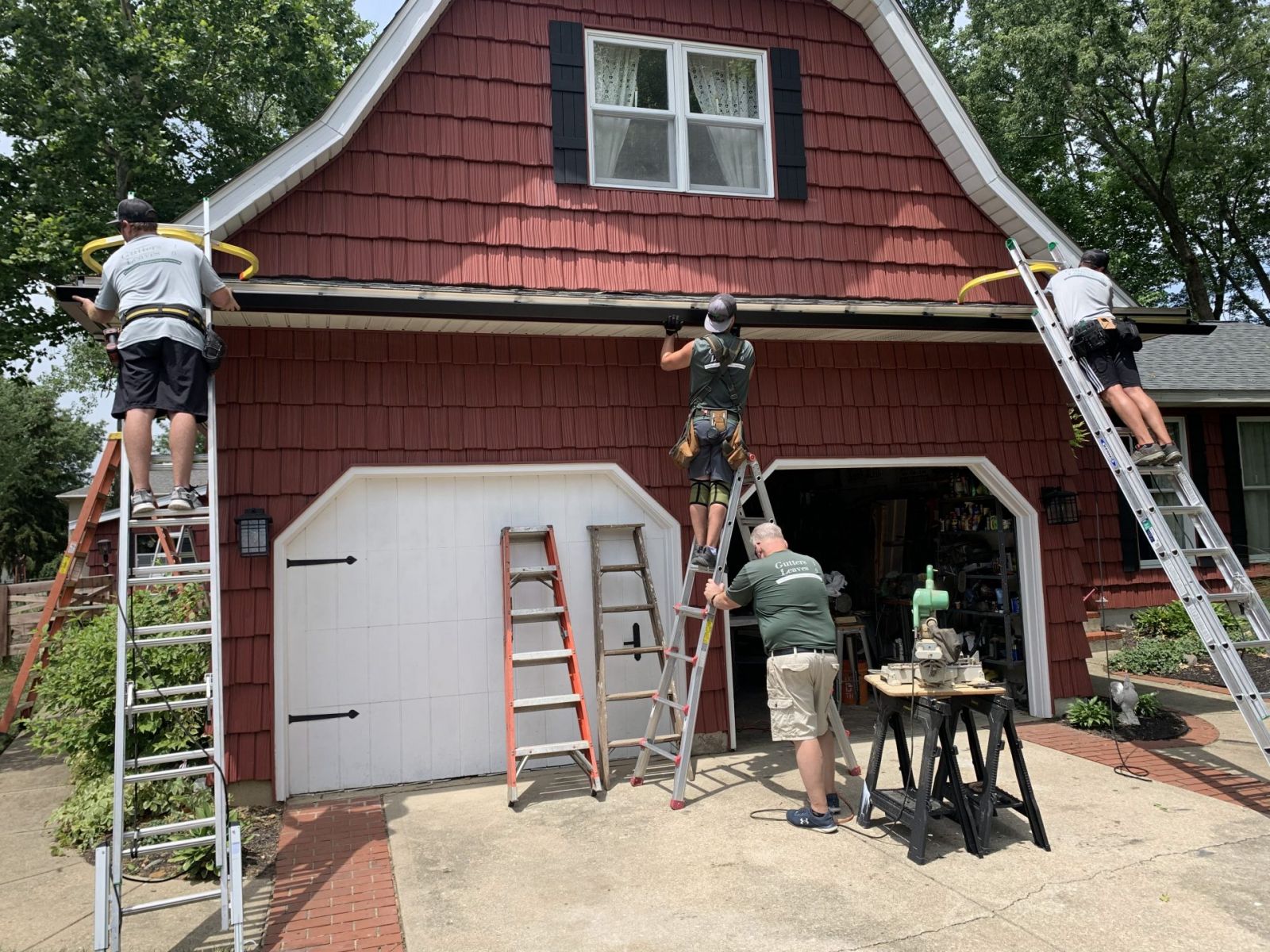K-Guard workers installing gutter system